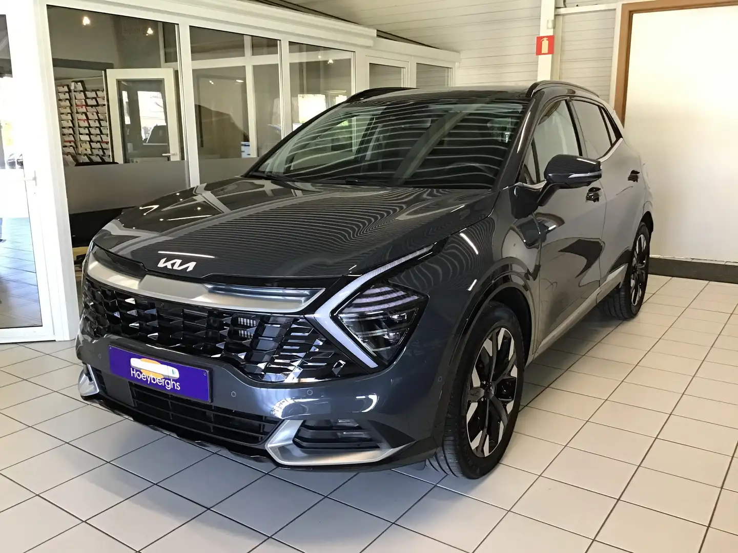 Kia Sportage 1.6 T-GDi AUTOMAAT BJ07/2023 13689KM CAMERA NAVI Grigio - 1