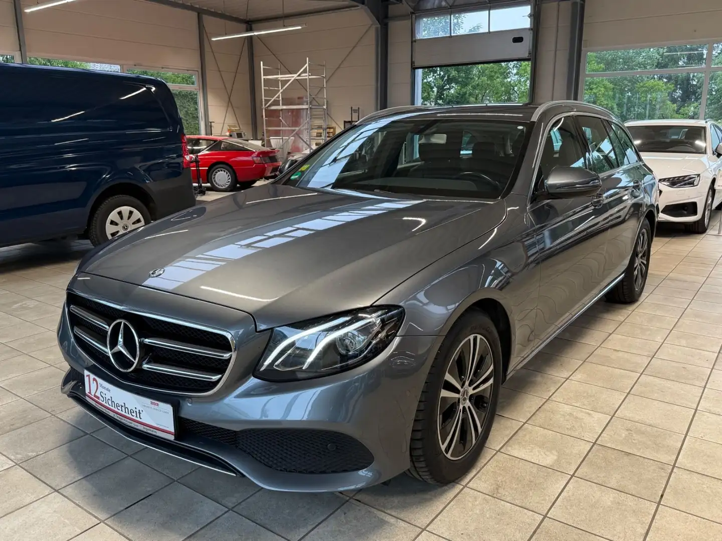 Mercedes-Benz E 220 d 4Matic 9G-TRONIC / 1Hand/Burmester/Navi Grijs - 1
