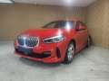 BMW 116 d Pack M Rood - thumbnail 1