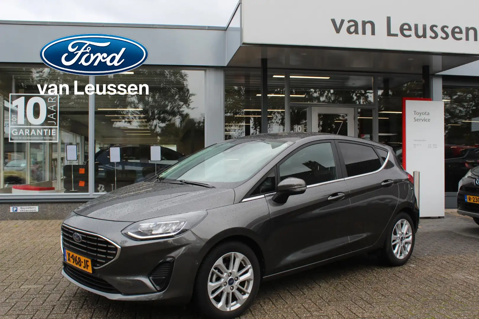 Ford Fiesta HYBRID 125PK TITANIUM 5-DEURS 4S-BANDEN LED STOEL/ Grijs - 1
