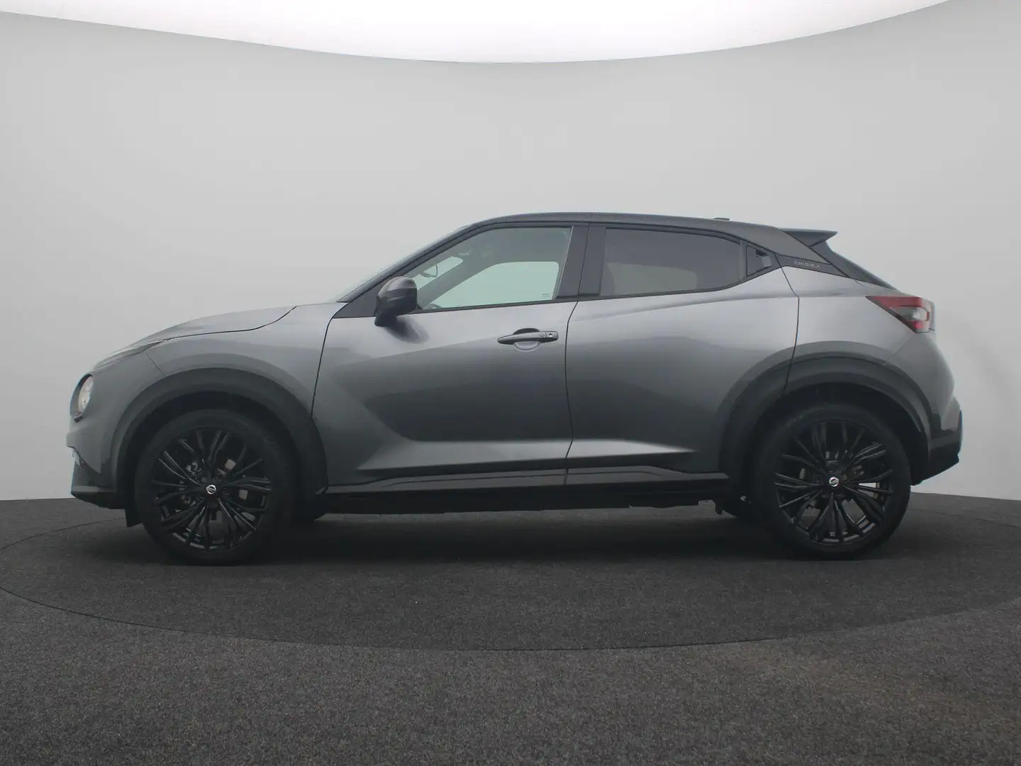 Nissan Juke 1.0 DIG-T Enigma | Groot Navi | Stoelverw. | Grijs - 2