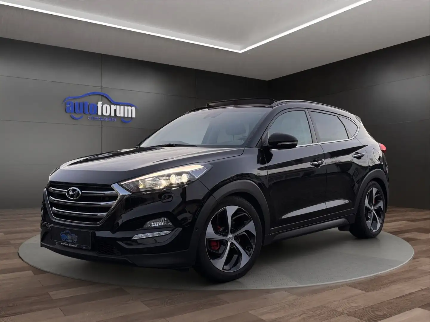 Hyundai TUCSON Premium 4WD AHK°PANO°LEDER°XENON°NAVI Schwarz - 1