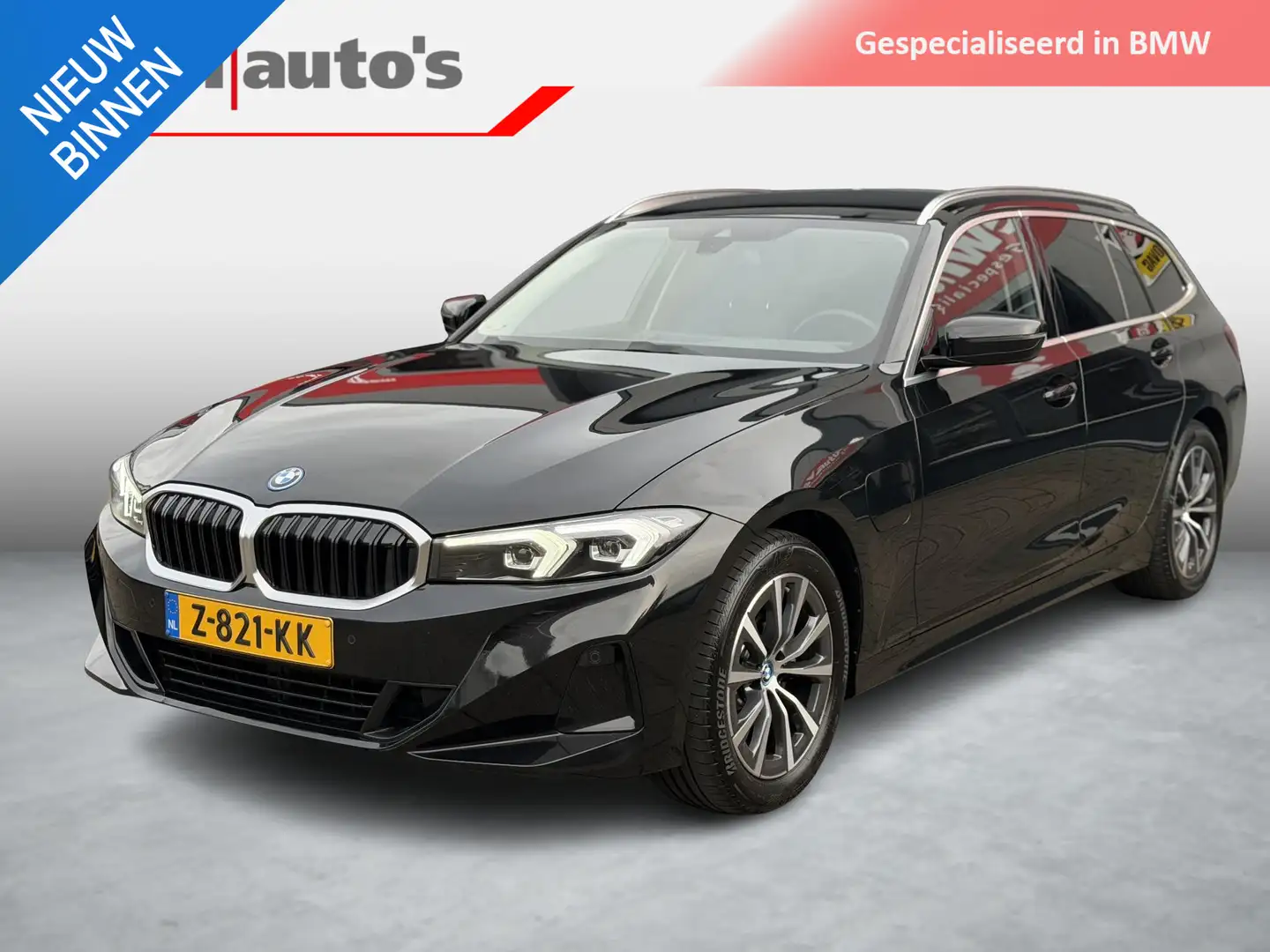 BMW 320 3-serie Touring 320e High Executive org NL auto Zwart - 1