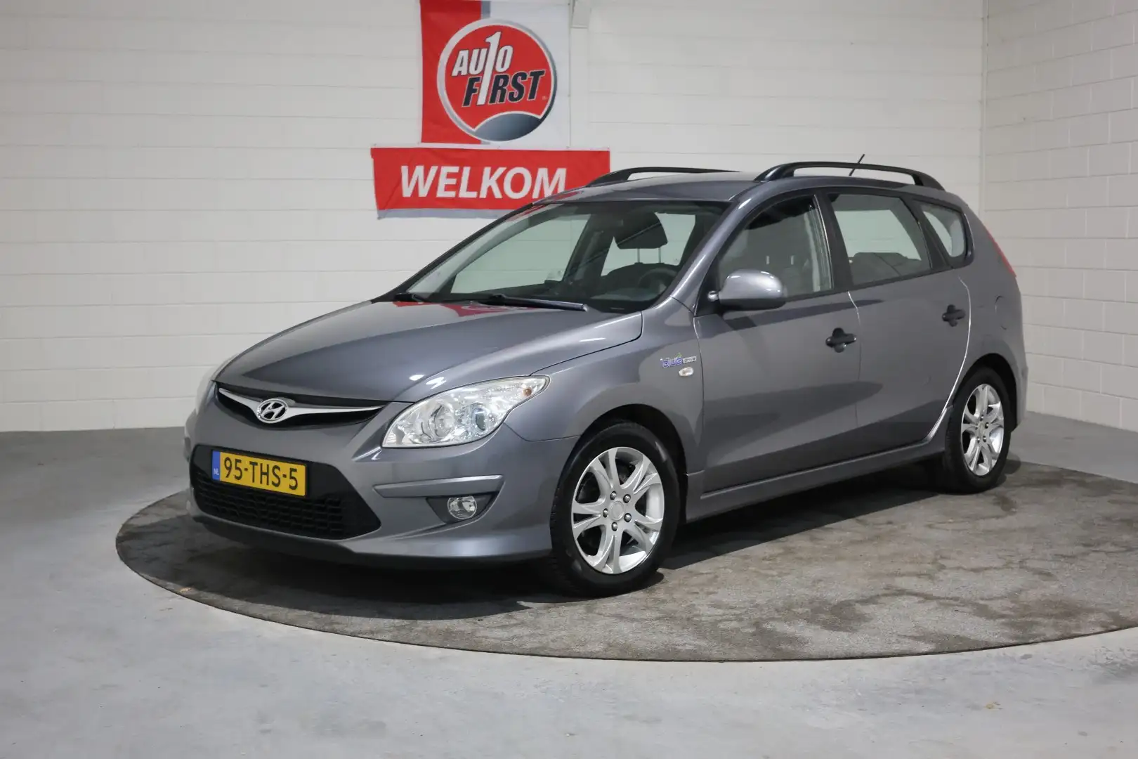 Hyundai i30 CW 1.4i i-Drive Cool, Airco, Trekhaak, Lichtmetaal Gris - 1