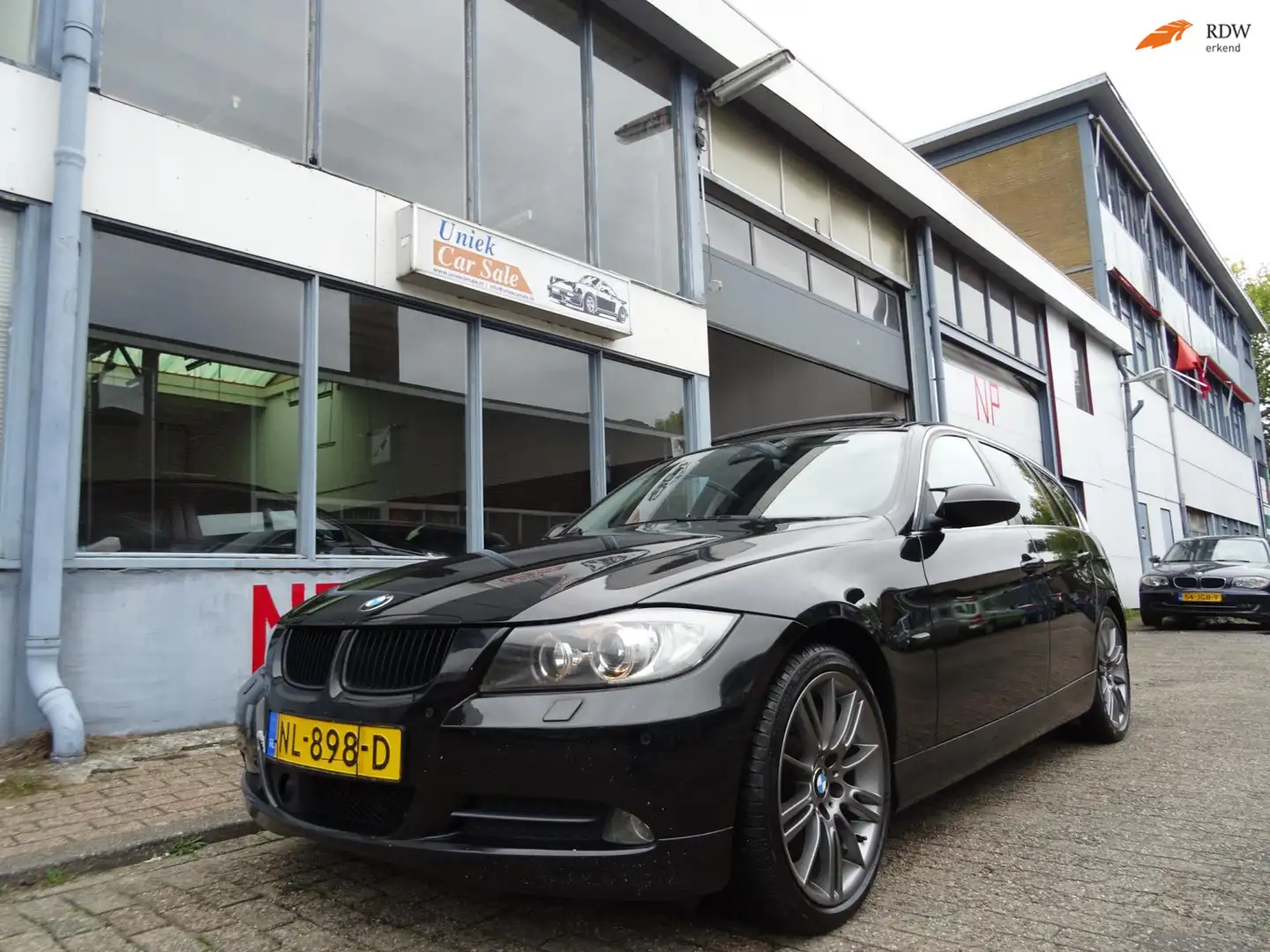 BMW 330 3-serie Touring 330xi High Executive | panoramadak Zwart - 1