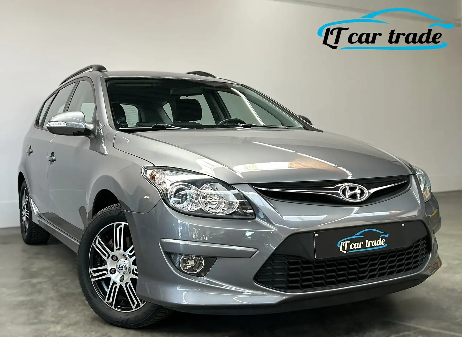 Hyundai i30 CW 1.4 Edition* Autom. airco * PDC * Garantie Gris - 1