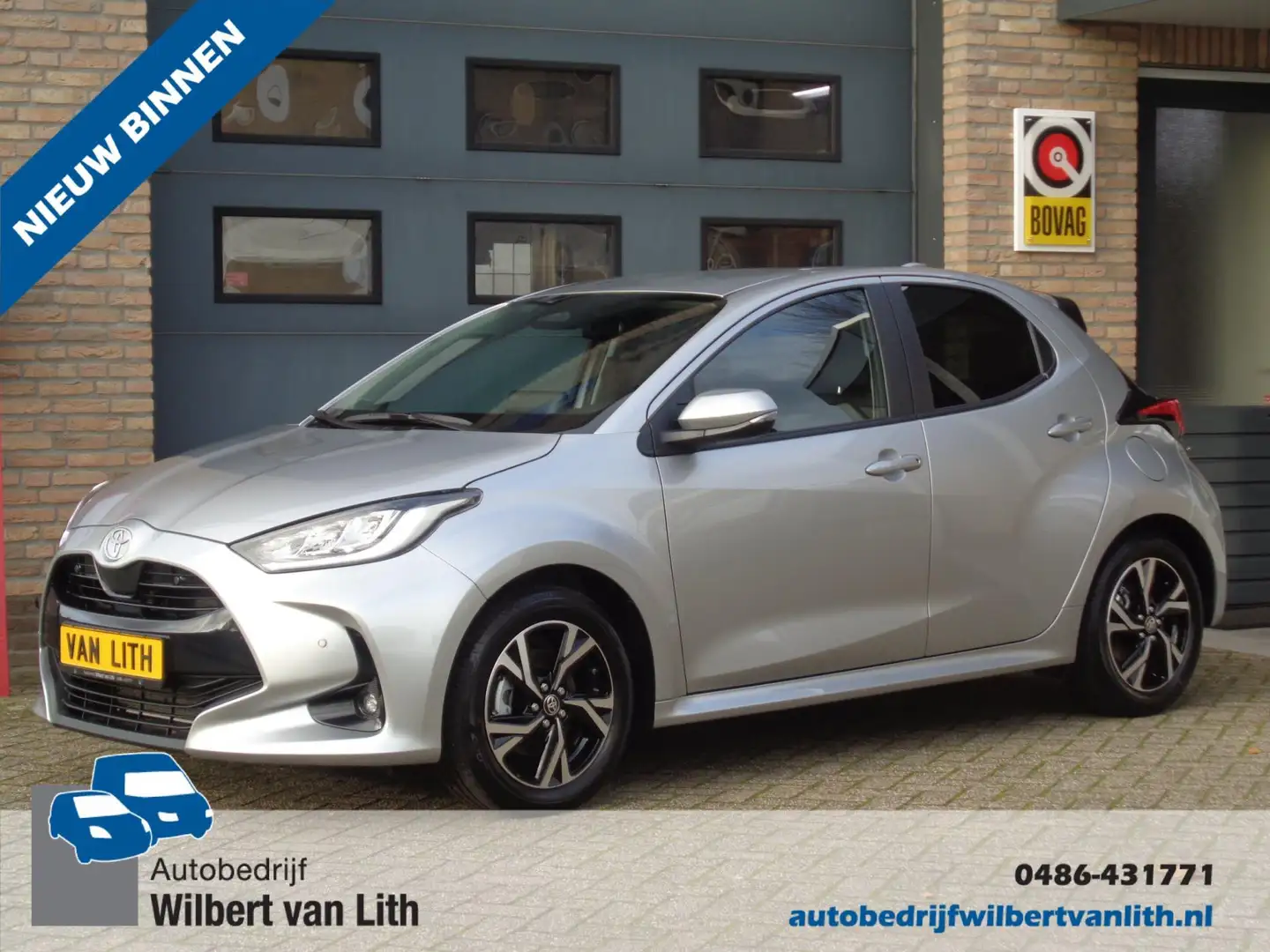 Toyota Yaris 1.5 Hybrid 115 Dynamic + Comfort Pack | Pdc v+a | Grijs - 1