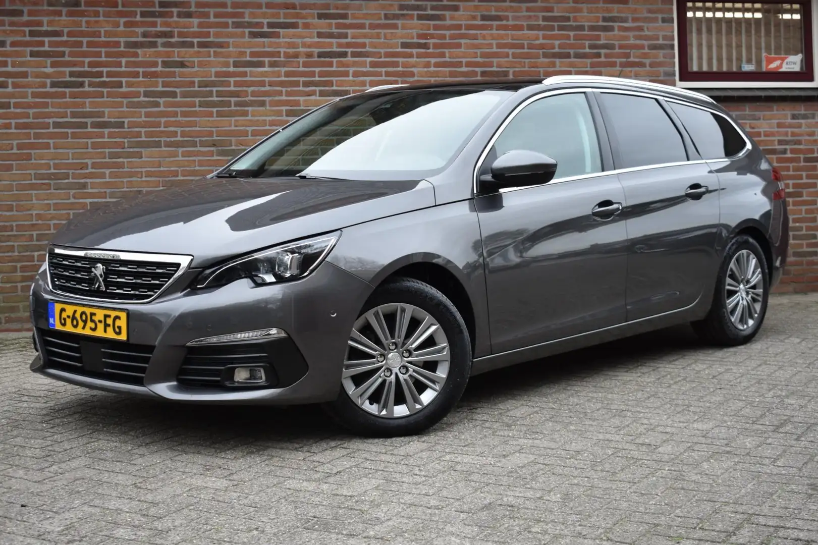 Peugeot 308 SW 1.2 PureTech Blue Lease Premium '19 LED Navi Cl Grijs - 1