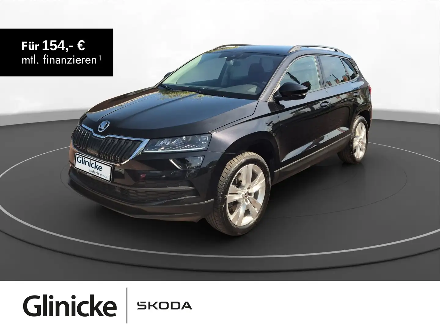 Skoda Karoq 2.0 TDI DSG 4x4 StandH Navi AHK Kamera Schwarz - 1