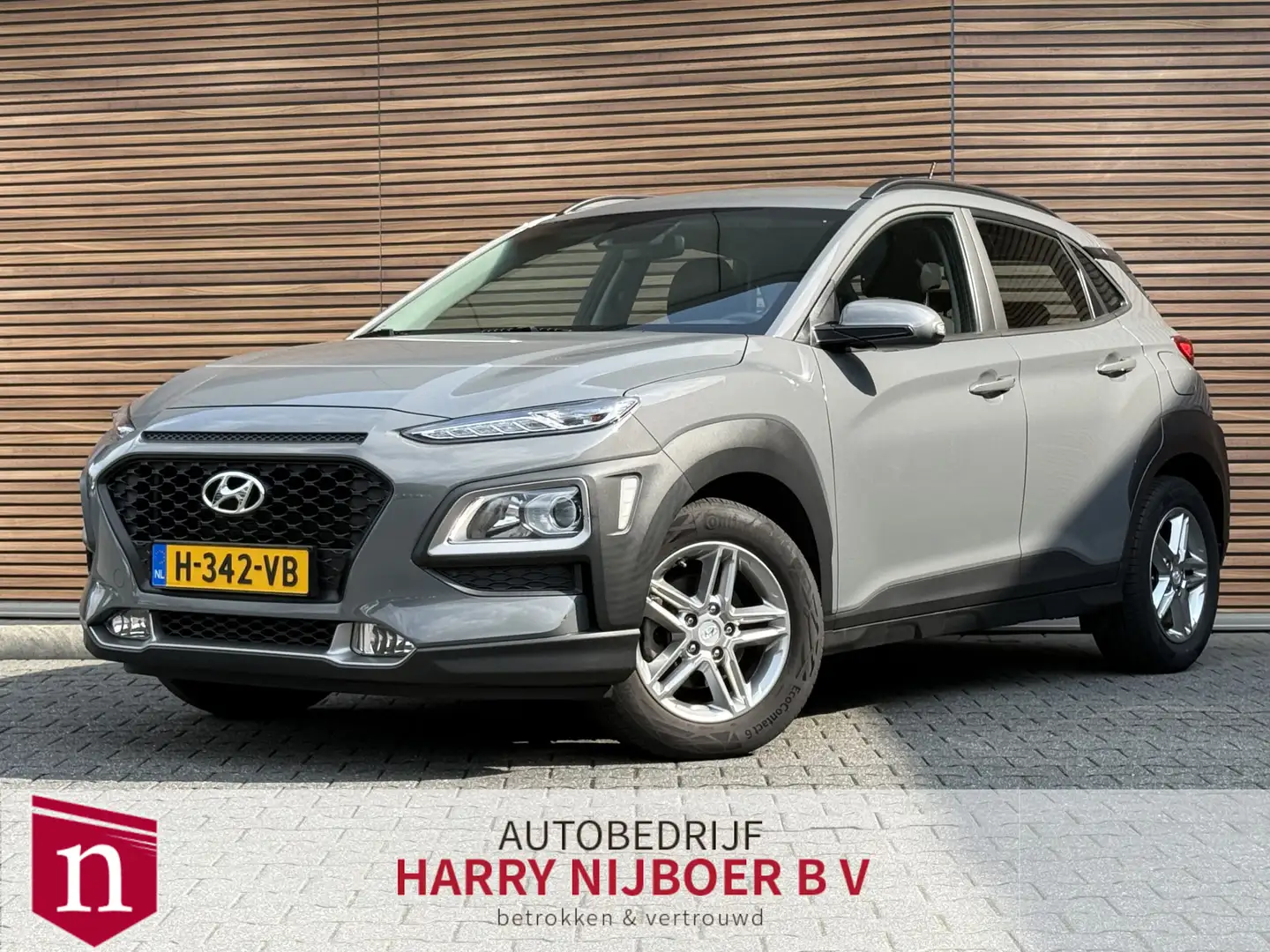 Hyundai KONA 1.0 T-GDI Comfort Parkeerhulp / Lm velgen / Cruise Grau - 1